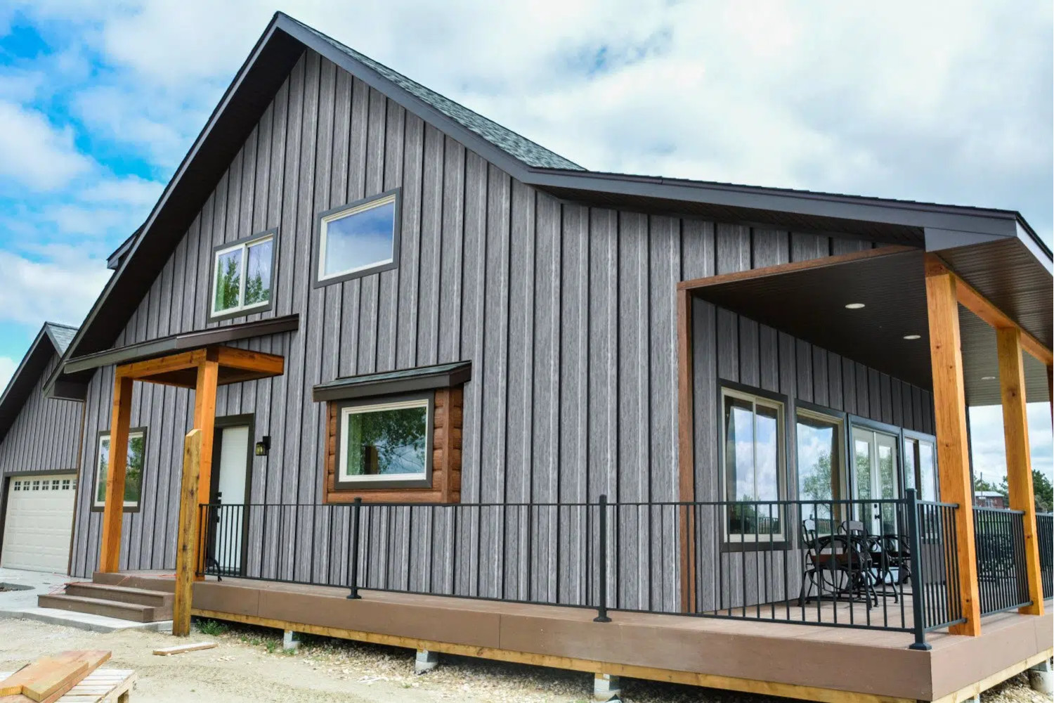 Modern cabin with vertical metal siding